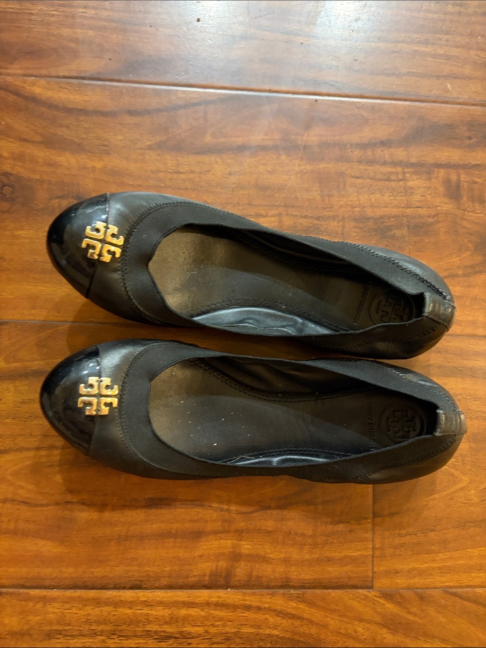 Tory Burch Black Ballet Flats with Gold Logo Accent